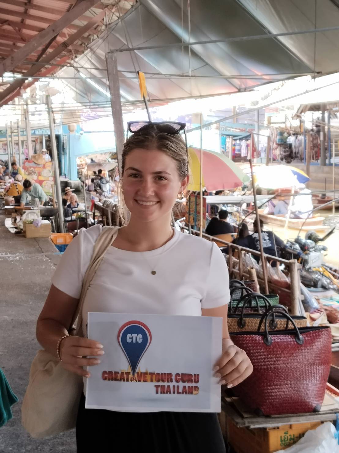 creative tour guru guide with sign